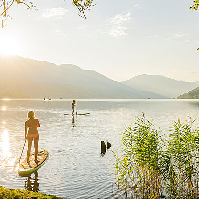 Der Sommer am See ️ Hier genießt du das perfekte Klima und frische Luft. Jeden Tag geht es in ein Strandbad – nur 10 Gehminuten von unserem Hotel entfernt!